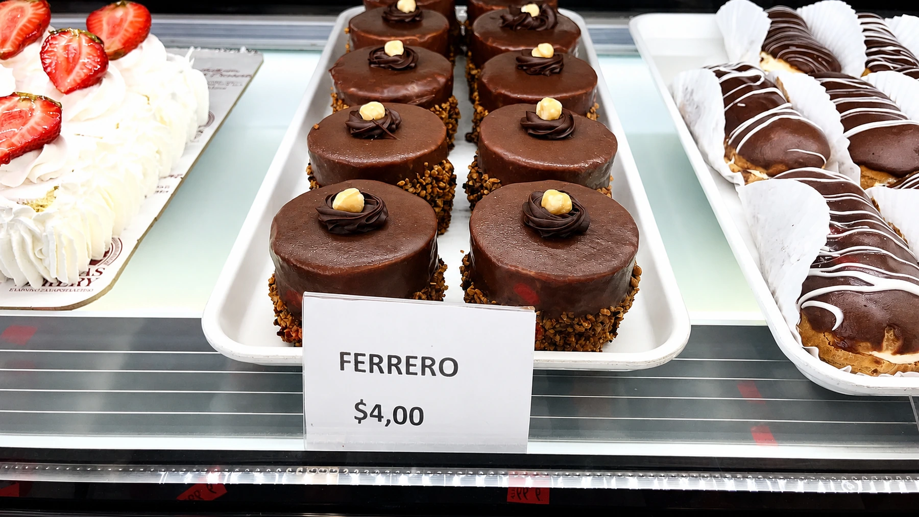 Individual Ferrero chocolate cakes in the bakery case