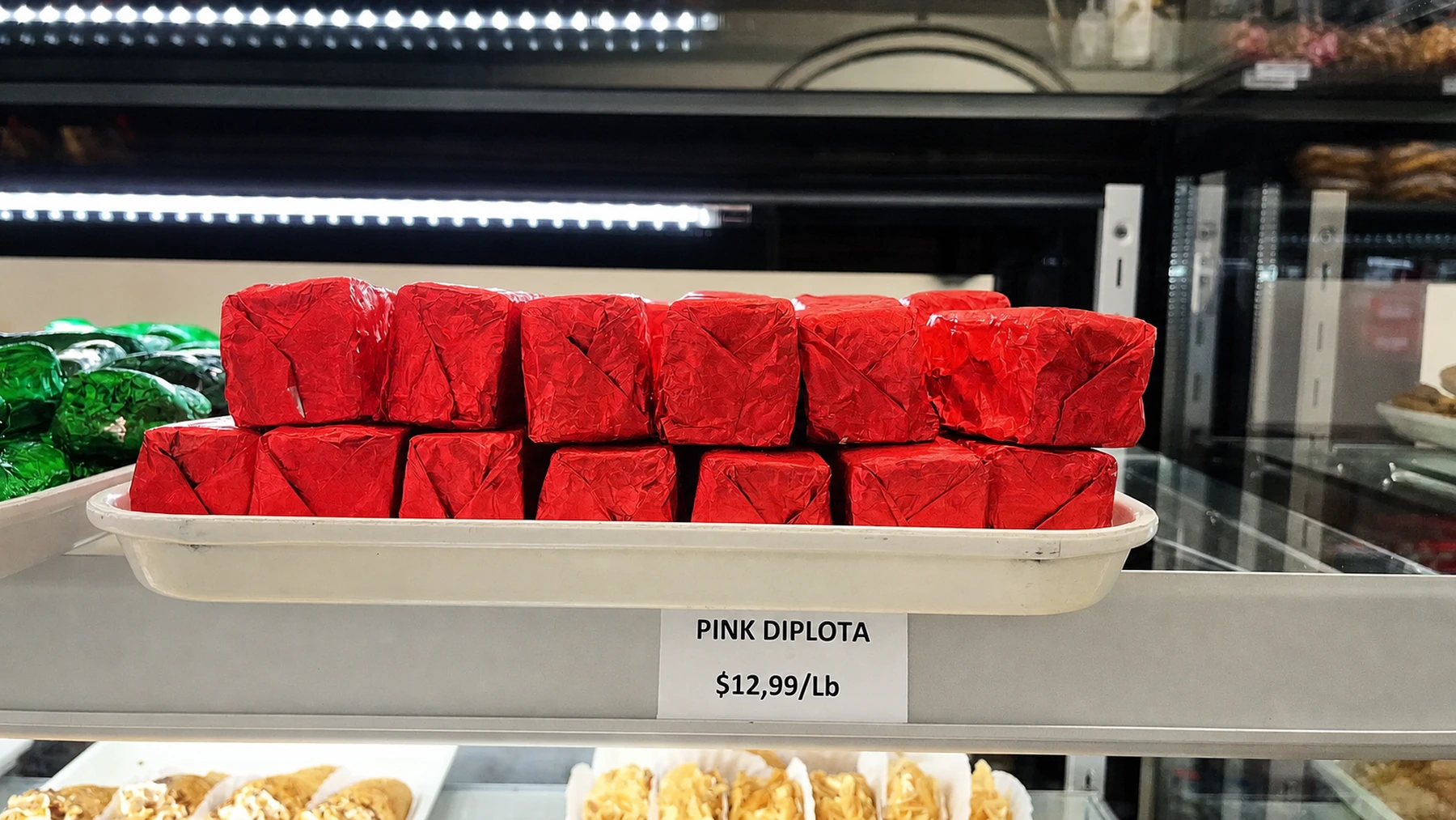 Pink wrapped diplota sweets in the display