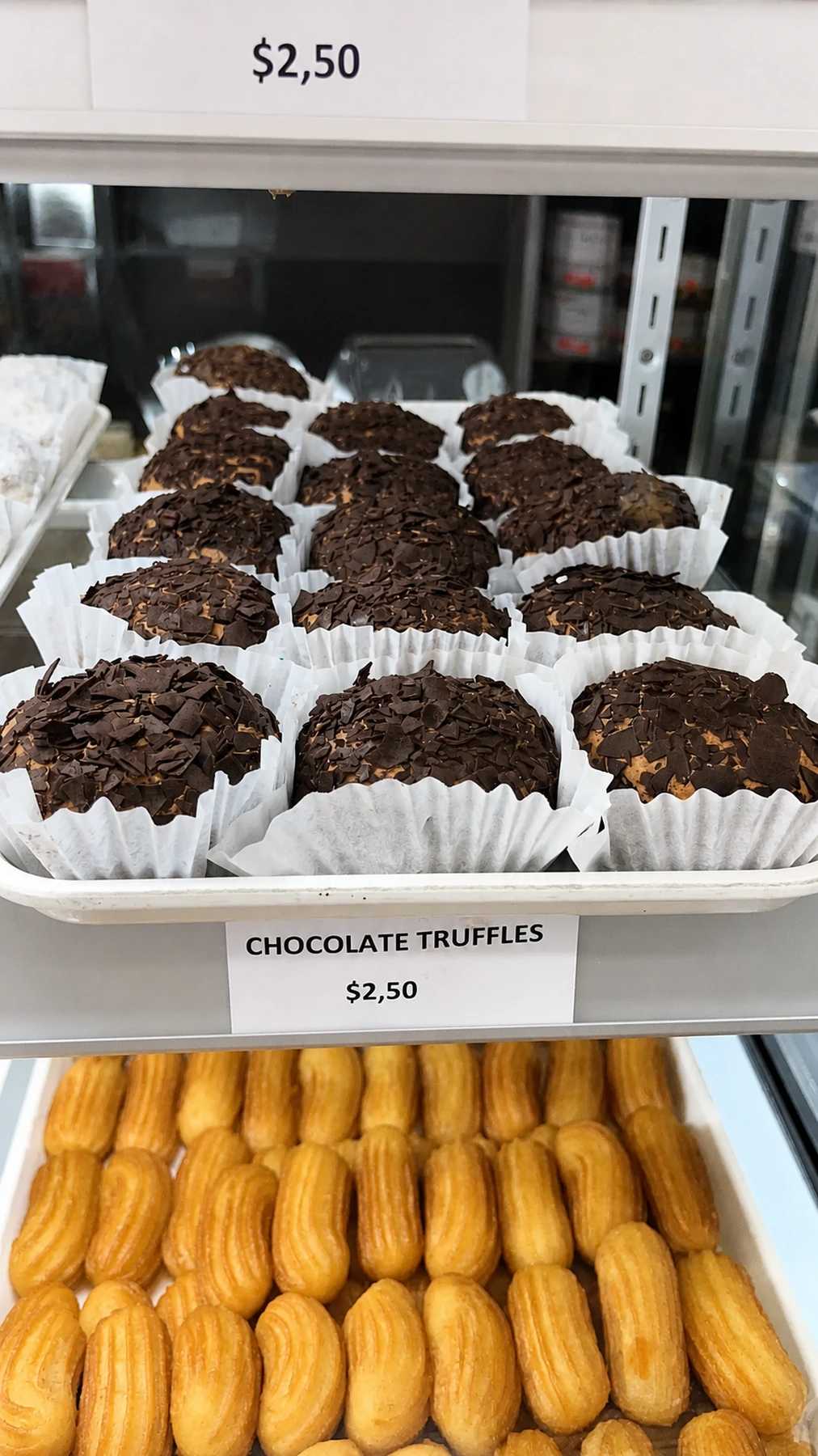 Chocolate truffles topped with chocolate pieces