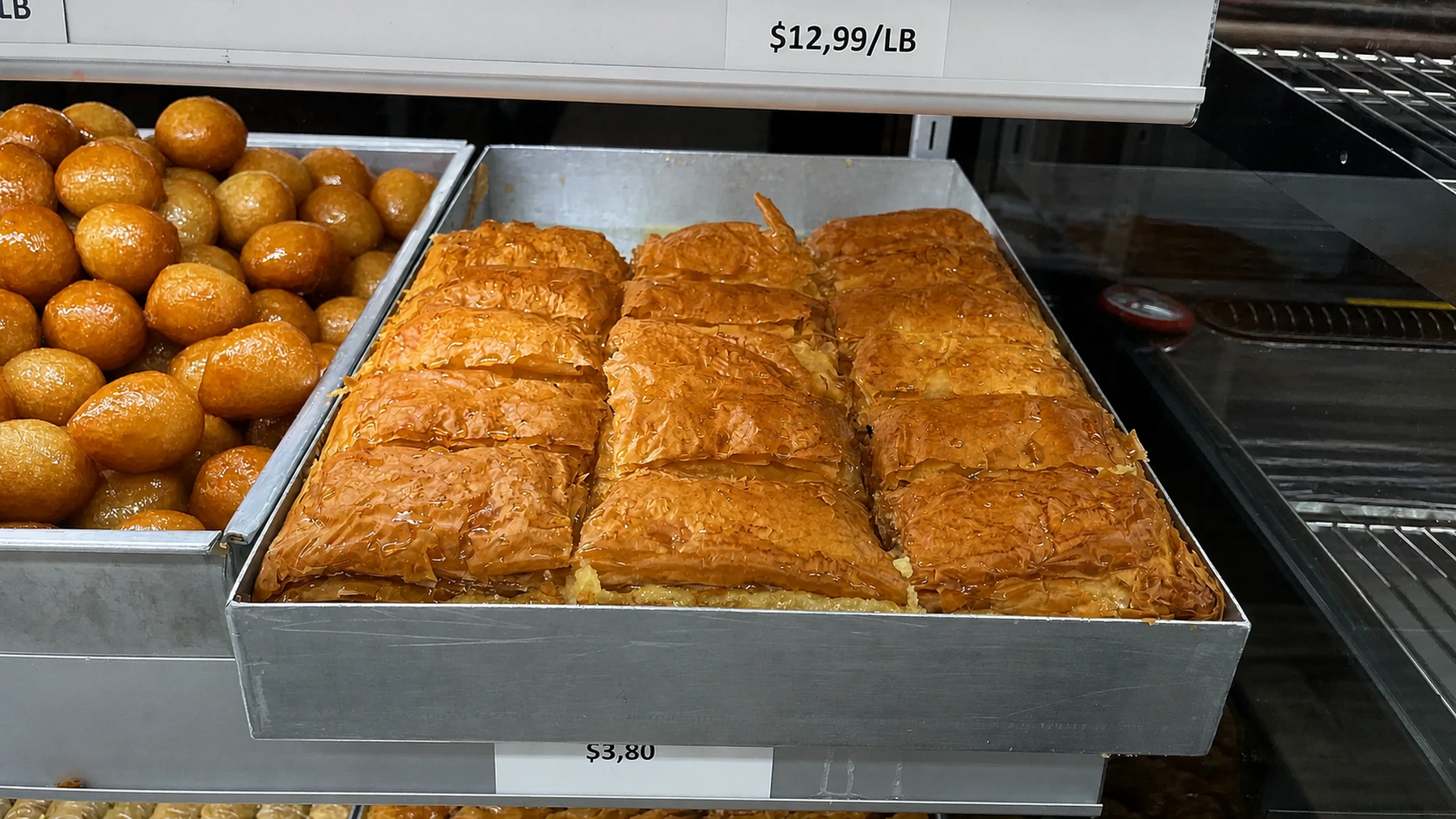 A large tray of galaktoboureko cut into portions