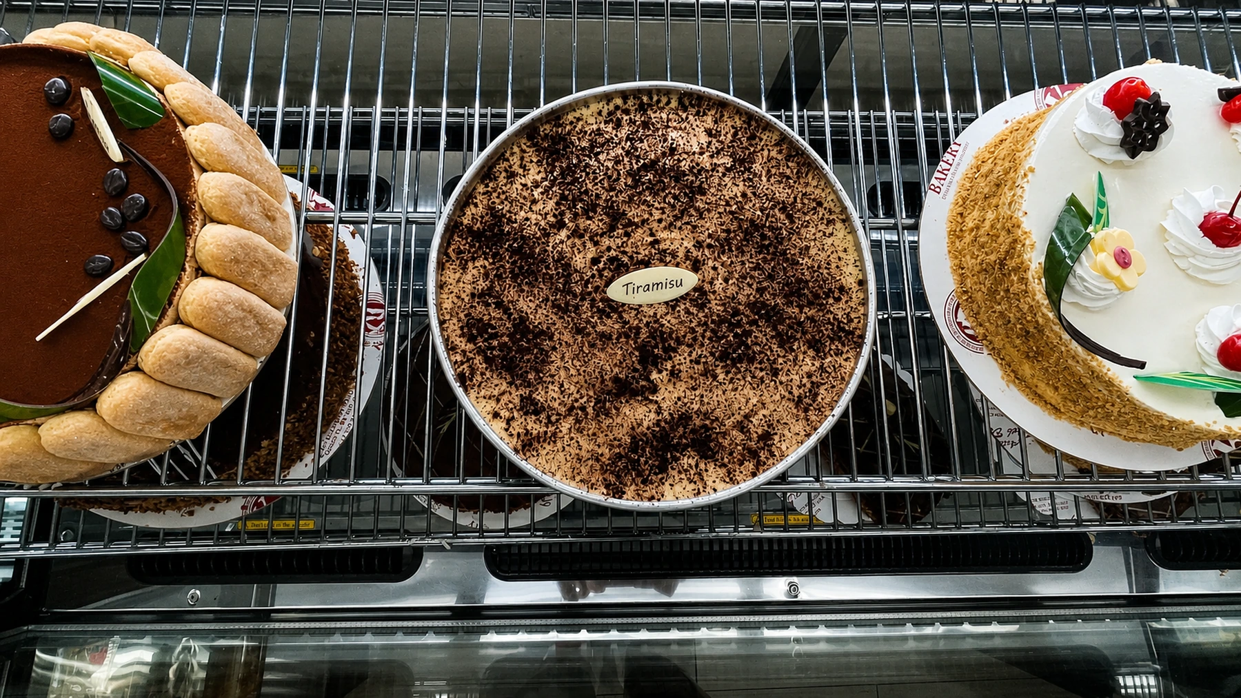 A round tiramisu cake displayed from above