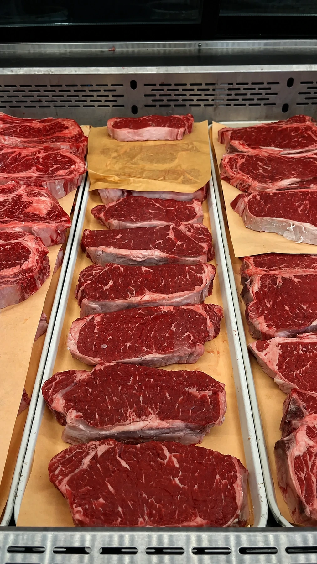 Rows of fresh steaks at the Kostas meat counter