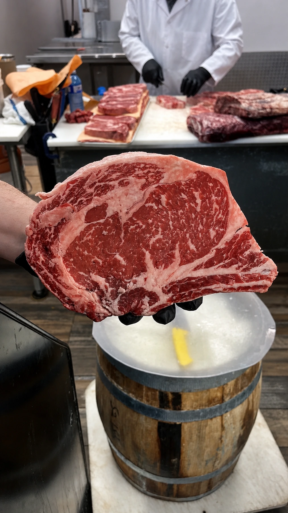 A well-marbled steak held at the Kostas butcher counter